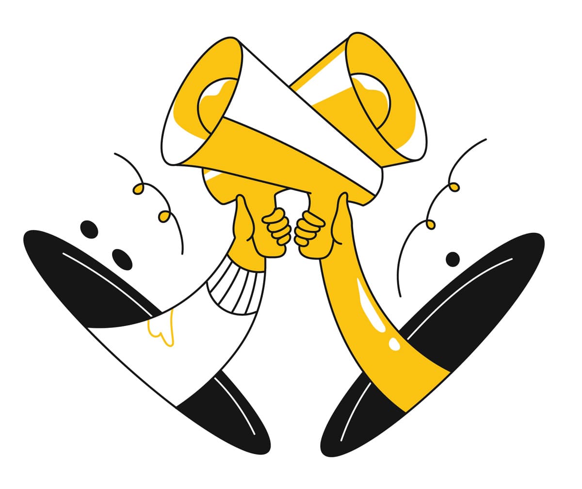 Two people hold up bull horns in celebration. Two people hold up bull horns in celebration.
